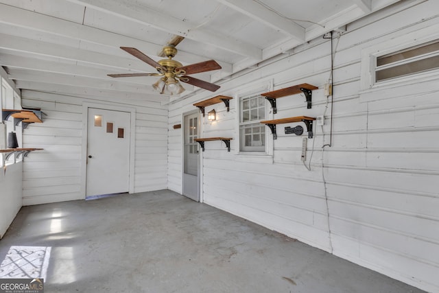 101 Leverett St, Warm Springs, GA 31830 - garage with a ceiling fan and wood walls