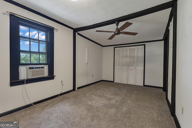 101 Leverett St, Warm Springs, GA 31830 - unfurnished bedroom featuring cooling unit, carpet flooring, crown molding, a textured ceiling, and a ceiling fan