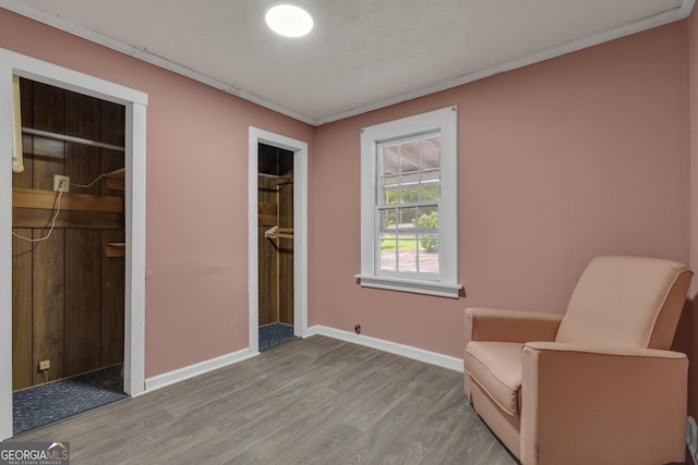 101 Leverett St, Warm Springs, GA 31830 - living area featuring wood finished floors and ornamental molding