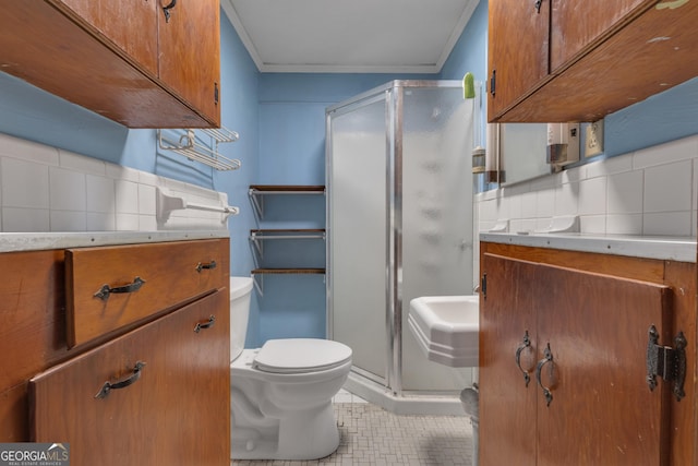 101 Leverett St, Warm Springs, GA 31830 - bathroom featuring a shower stall, vanity, ornamental molding, tile patterned flooring, and tasteful backsplash