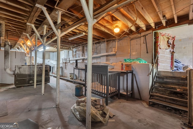 101 Leverett St, Warm Springs, GA 31830 - unfinished below grade area featuring concrete block wall