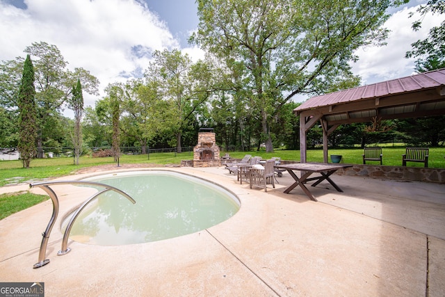 124 Old Salem Trl, Pine Mountain, GA 31822 - view of pool featuring an outdoor stone fireplace, a gazebo, a patio area, and view of wooded area