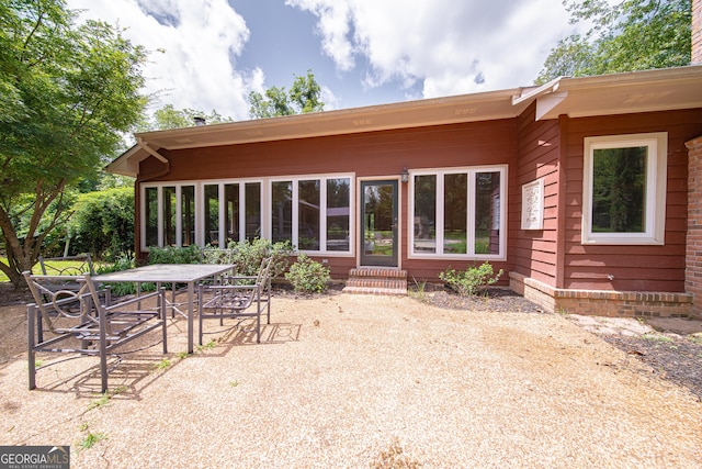 124 Old Salem Trl, Pine Mountain, GA 31822 - back of house featuring a patio, outdoor dining space, and entry steps