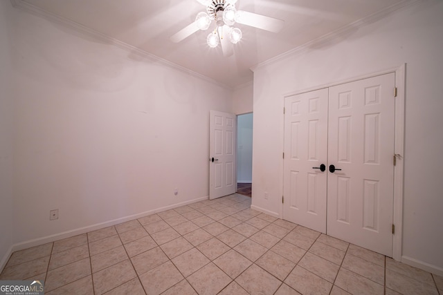 124 Old Salem Trl, Pine Mountain, GA 31822 - unfurnished bedroom with ornamental molding, light tile patterned floors, a closet, and ceiling fan