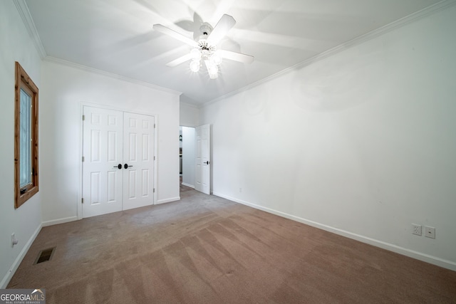 124 Old Salem Trl, Pine Mountain, GA 31822 - unfurnished bedroom featuring ornamental molding, carpet, a closet, and ceiling fan
