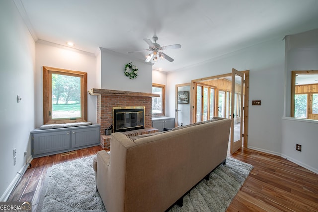 124 Old Salem Trl, Pine Mountain, GA 31822 - living room featuring ceiling fan, a fireplace, crown molding, wood finished floors, and recessed lighting
