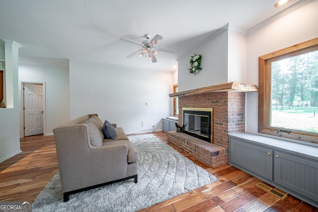 124 Old Salem Trl, Pine Mountain, GA 31822 - living area with a ceiling fan, a fireplace, ornamental molding, light wood-type flooring, and recessed lighting