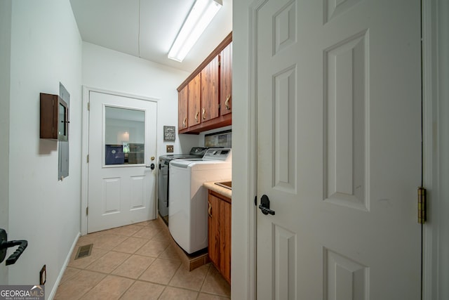 124 Old Salem Trl, Pine Mountain, GA 31822 - washroom with cabinet space, independent washer and dryer, and light tile patterned floors