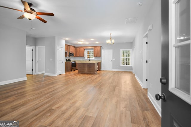 3177 Rodgers Creek Rd Unit 169, Ellijay, GA 30540 - unfurnished living room with a chandelier, ceiling fan, and light wood-style flooring