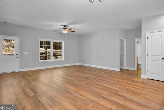 3177 Rodgers Creek Rd Unit 169, Ellijay, GA 30540 - unfurnished living room featuring ceiling fan, healthy amount of natural light, and light wood-style flooring