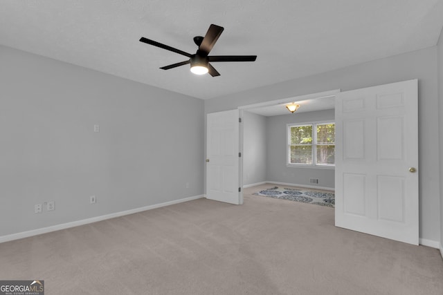 115 Rockhurst Chase, Tyrone, GA 30290 - empty room with ceiling fan and light carpet