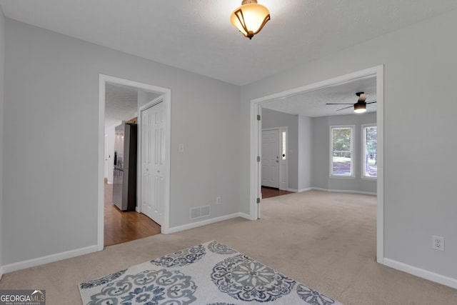 115 Rockhurst Chase, Tyrone, GA 30290 - unfurnished room with carpet and a ceiling fan