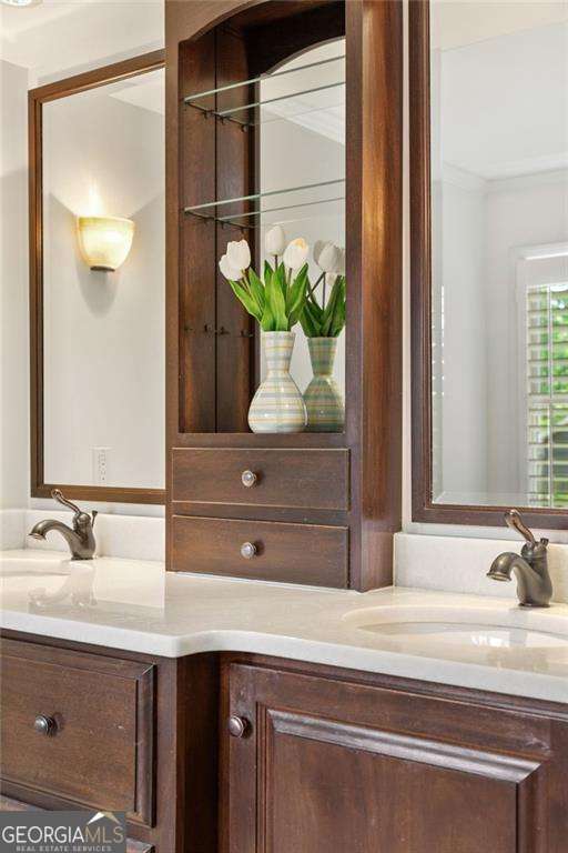 1117 Haven Glen Ln NE, Brookhaven, GA 30319 - bathroom featuring vanity and ornamental molding