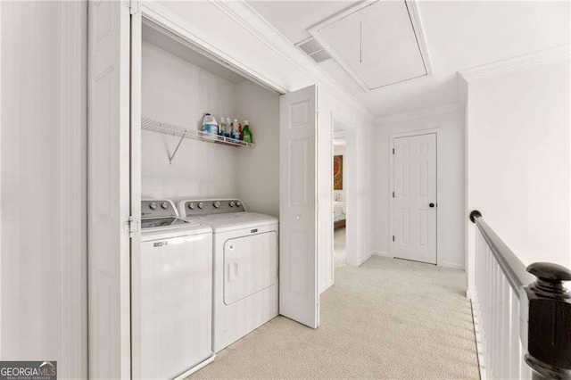 1117 Haven Glen Ln NE, Brookhaven, GA 30319 - laundry room featuring attic access, washing machine and dryer, light colored carpet, and crown molding