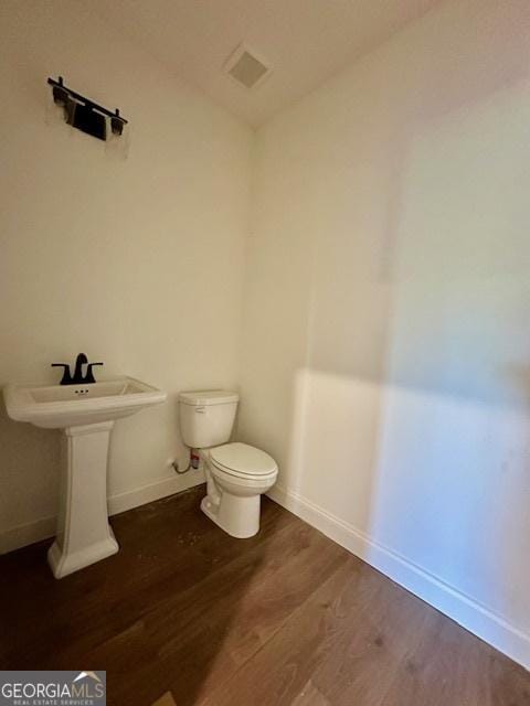 3609 Youngs Mill Rd, Hogansville, GA 30230 - bathroom featuring wood finished floors and toilet