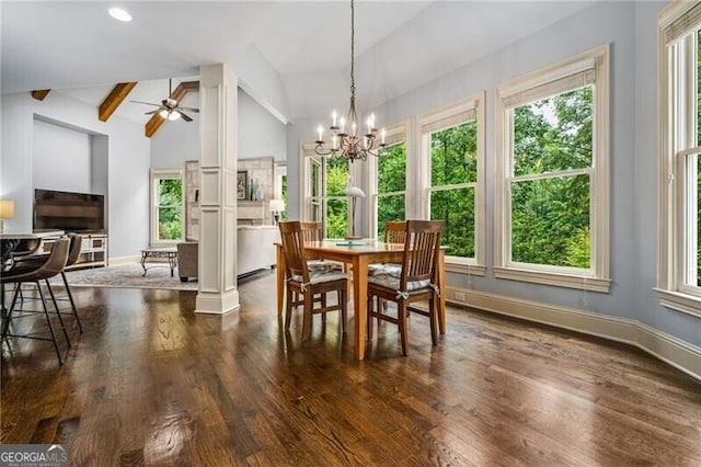 217 Fernwood Pl, Woodstock, GA 30188 - dining area with healthy amount of natural light, dark wood-style floors, a chandelier, ceiling fan, and beam ceiling