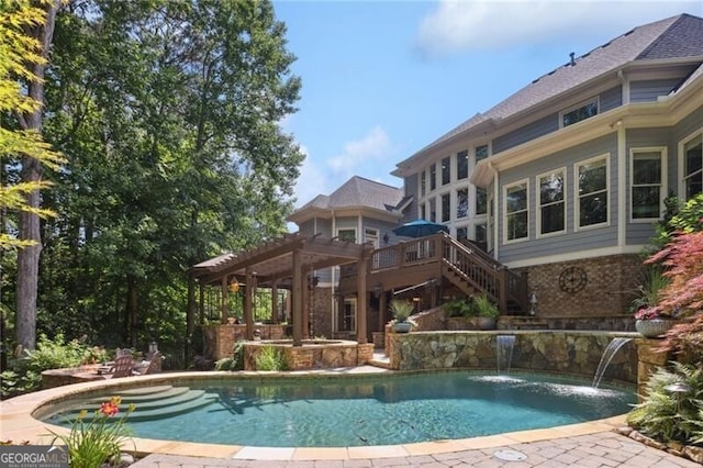 217 Fernwood Pl, Woodstock, GA 30188 - view of swimming pool with stairway, a wooden deck, a patio area, and a pool with connected hot tub