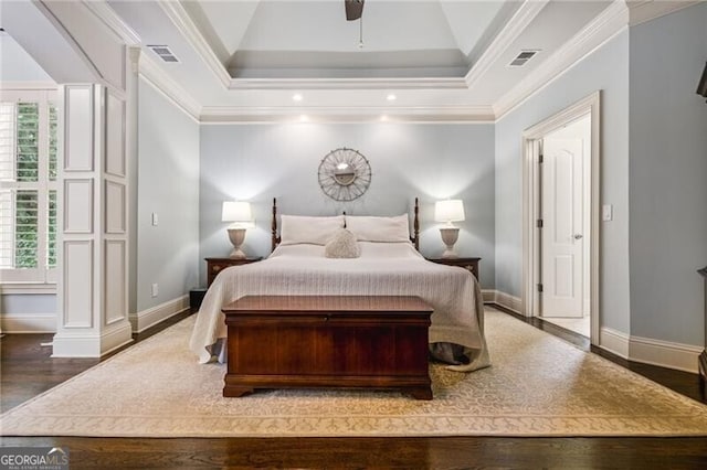 217 Fernwood Pl, Woodstock, GA 30188 - bedroom with multiple windows, wood finished floors, and ornamental molding