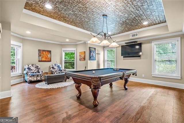 217 Fernwood Pl, Woodstock, GA 30188 - rec room with a tray ceiling, ornamental molding, wood finished floors, healthy amount of natural light, and an ornate ceiling