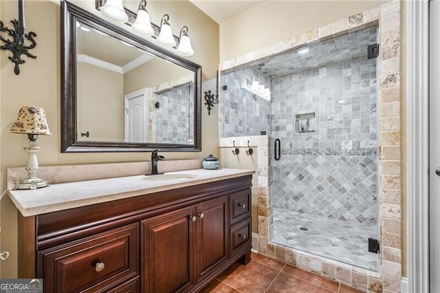 217 Fernwood Pl, Woodstock, GA 30188 - bathroom with vanity, tile patterned floors, a stall shower, and ornamental molding