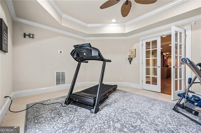 217 Fernwood Pl, Woodstock, GA 30188 - exercise area with french doors, carpet, a raised ceiling, ornamental molding, and a ceiling fan