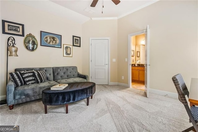 217 Fernwood Pl, Woodstock, GA 30188 - living area featuring ceiling fan, light colored carpet, and crown molding