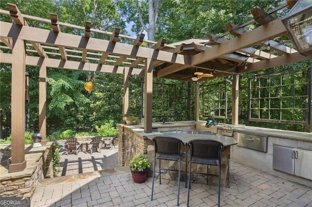 217 Fernwood Pl, Woodstock, GA 30188 - view of patio with a pergola, an outdoor kitchen, and exterior bar