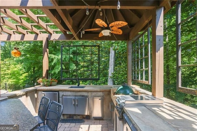 217 Fernwood Pl, Woodstock, GA 30188 - view of patio / terrace with ceiling fan and exterior kitchen