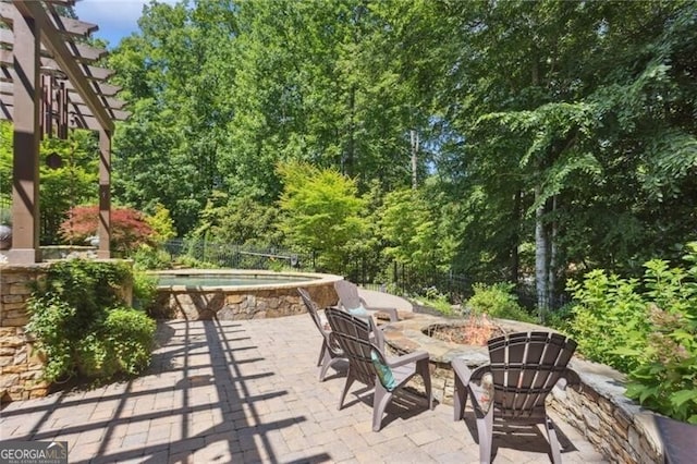 217 Fernwood Pl, Woodstock, GA 30188 - view of patio / terrace with a fire pit and a hot tub