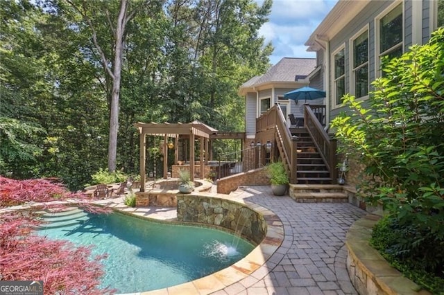 217 Fernwood Pl, Woodstock, GA 30188 - outdoor pool with stairs, a patio, and a deck