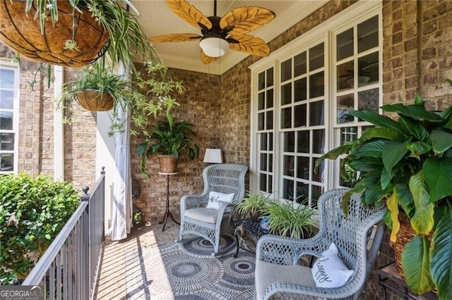 217 Fernwood Pl, Woodstock, GA 30188 - covered porch featuring a ceiling fan