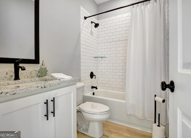 192 Greyfairs Ave, Senoia, GA 30276 - bathroom featuring vanity, shower / tub combo with curtain, and wood finished floors