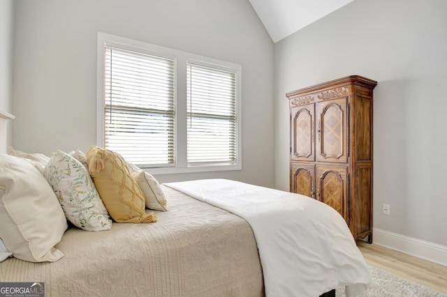 192 Greyfairs Ave, Senoia, GA 30276 - bedroom with vaulted ceiling and light wood-type flooring