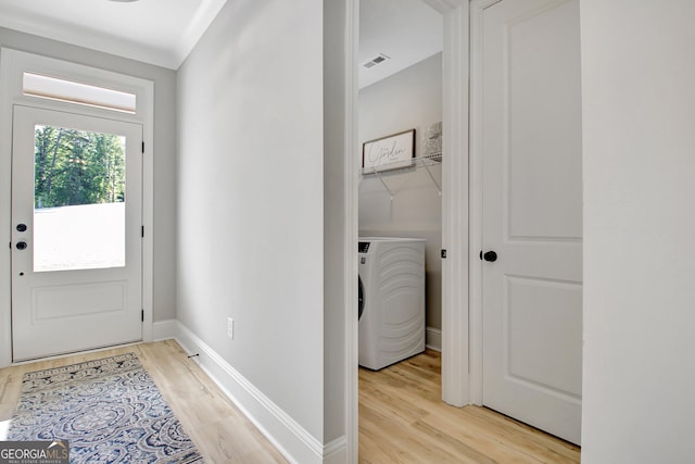 192 Greyfairs Ave, Senoia, GA 30276 - doorway with washer / dryer and light wood-style floors