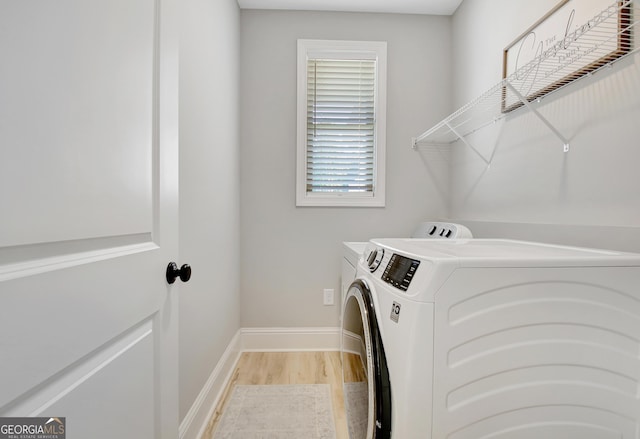 192 Greyfairs Ave, Senoia, GA 30276 - laundry area featuring separate washer and dryer and light wood-type flooring