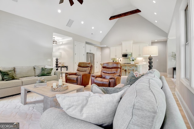 192 Greyfairs Ave, Senoia, GA 30276 - living room with high vaulted ceiling, a ceiling fan, and recessed lighting