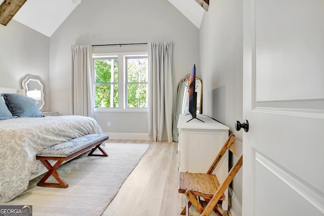 192 Greyfairs Ave, Senoia, GA 30276 - bedroom featuring light wood finished floors and high vaulted ceiling