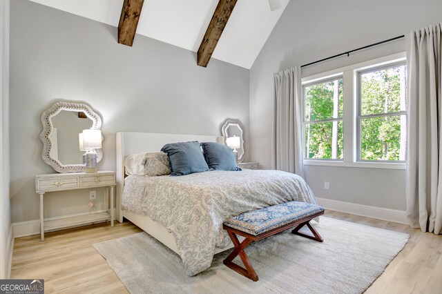 192 Greyfairs Ave, Senoia, GA 30276 - bedroom featuring wood finished floors, beamed ceiling, and high vaulted ceiling