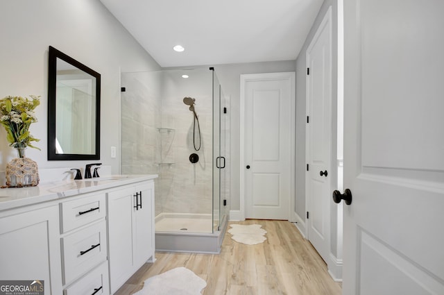 192 Greyfairs Ave, Senoia, GA 30276 - full bath featuring a stall shower, vanity, wood finished floors, and recessed lighting