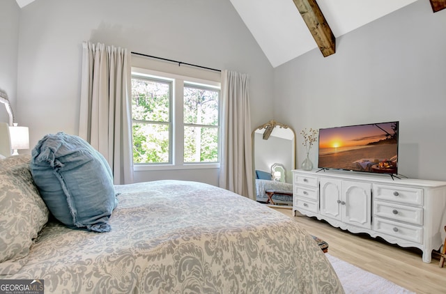 192 Greyfairs Ave, Senoia, GA 30276 - bedroom featuring high vaulted ceiling, light wood-style floors, and beamed ceiling
