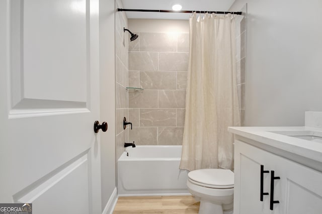 192 Greyfairs Ave, Senoia, GA 30276 - bathroom with vanity, shower / bath combo with shower curtain, and wood finished floors
