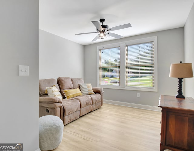 192 Greyfairs Ave, Senoia, GA 30276 - living area with ceiling fan and light wood-style floors