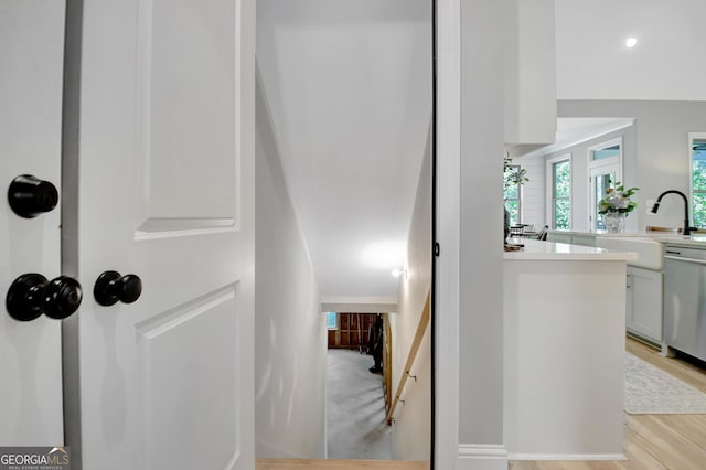 192 Greyfairs Ave, Senoia, GA 30276 - corridor featuring a sink and light wood finished floors