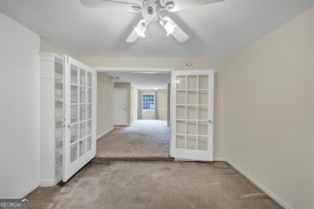 58 Monet Ct NW, Atlanta, GA 30327 - unfurnished room featuring french doors, carpet floors, and ceiling fan