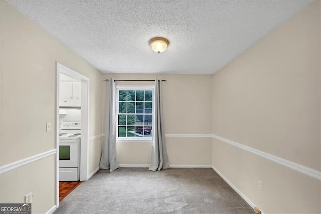 58 Monet Ct NW, Atlanta, GA 30327 - empty room with a textured ceiling and carpet