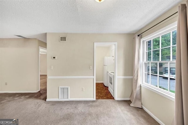 58 Monet Ct NW, Atlanta, GA 30327 - spare room with a textured ceiling and carpet floors