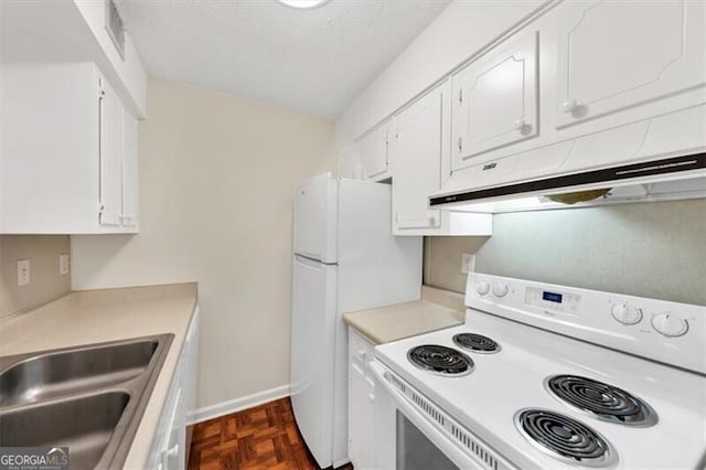 58 Monet Ct NW, Atlanta, GA 30327 - kitchen with white appliances, white cabinets, and light countertops