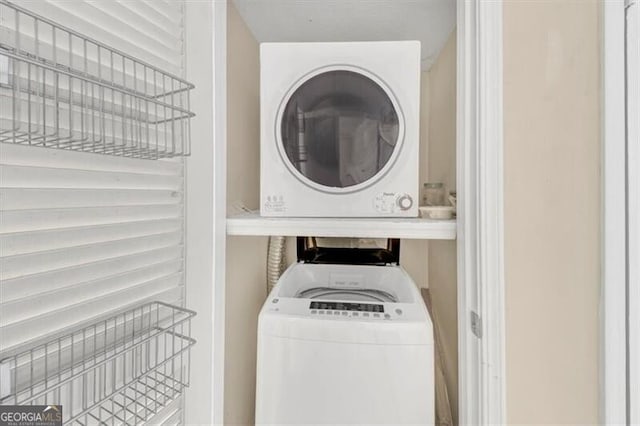 58 Monet Ct NW, Atlanta, GA 30327 - laundry room with stacked washer and clothes dryer