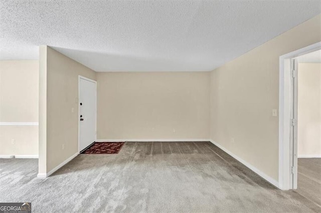 58 Monet Ct NW, Atlanta, GA 30327 - carpeted spare room with a textured ceiling