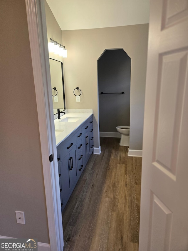 388 Kay Dr, Winder, GA 30680 - bathroom with double vanity and wood finished floors